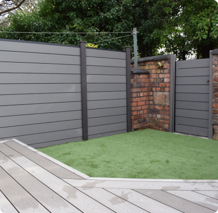 Contemporary garden fencing, brickwork and paving