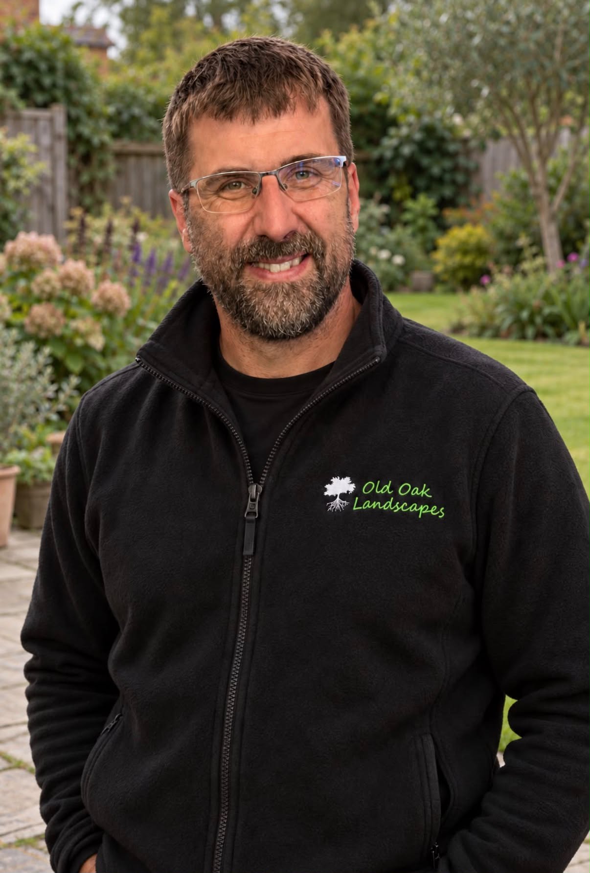 Steve from Old Oak Landscapes, photographed in a garden